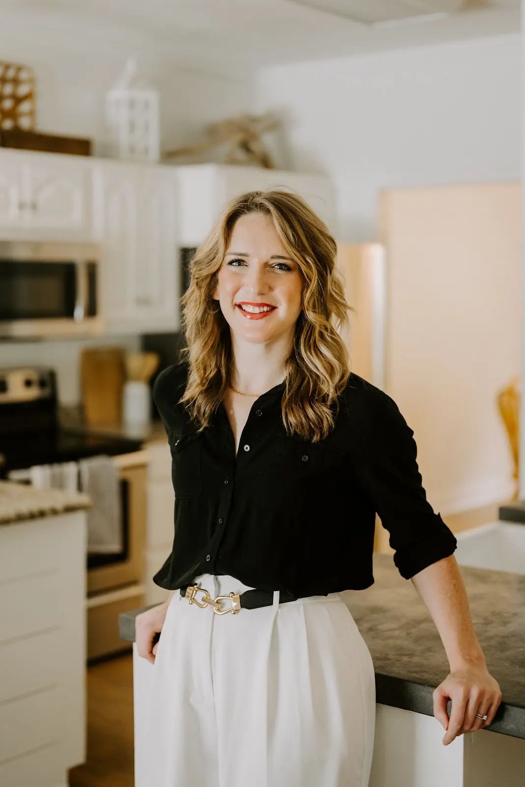 Rachel Ferrell standing beside a kitchen island